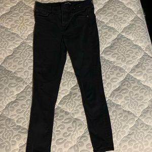 Black stretch mid rise legging jeans